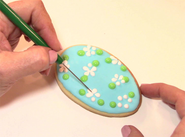 Royal Icing Decorations in a Forget Me Not Design